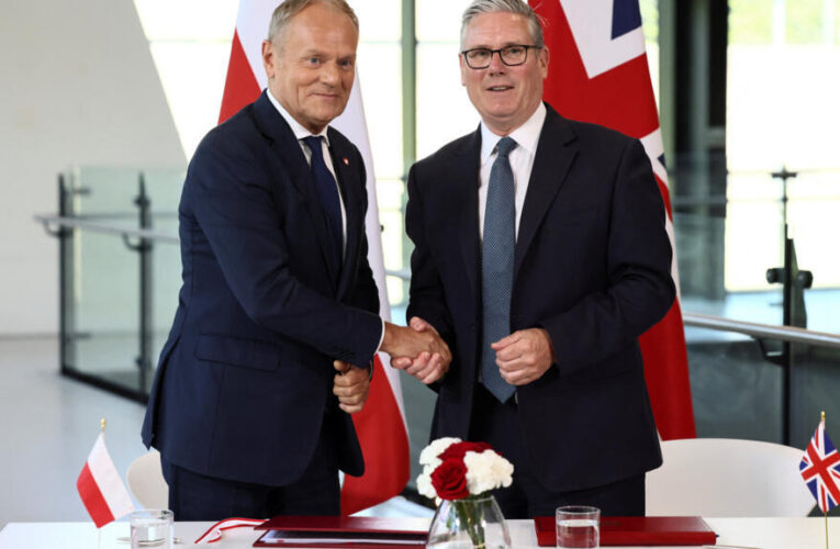 Starmer and Tusk sign UK–Poland defence pact amid warnings over Russian threats