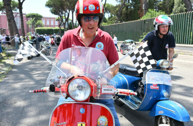 ‘Vespa is a way of life’: Thousands ride through Rome as Italy’s iconic scooter turns 80