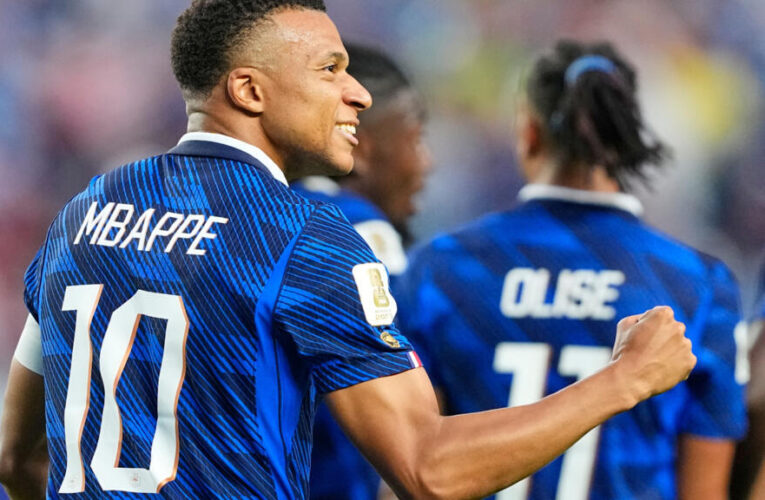 World Cup: France into last 32 with win over Iraq despite two-hour weather delay