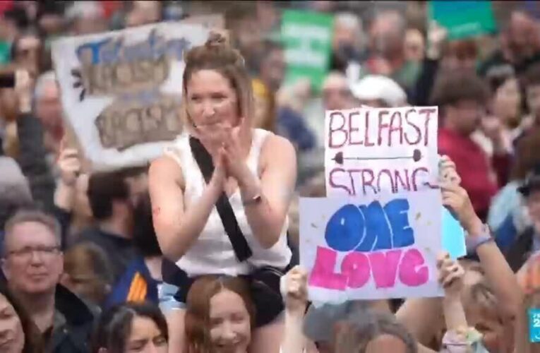 Thousands rally in Belfast to condemn anti-immigrant rioting that followed stabbing