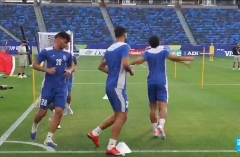 Iran take World Cup centre stage as they arrive in US