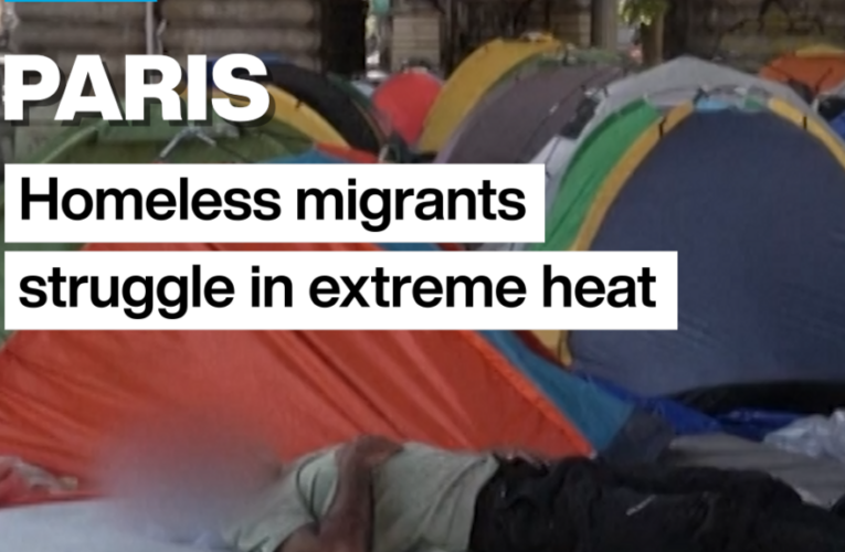 Homeless migrants living in Paris struggle in extreme heat