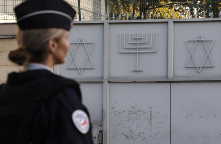 Hundreds evacuated from Paris suburb after weapons found near synagogue