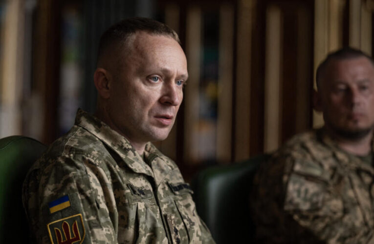 Ukrainians welcome new army chief but seek return of fired defence minister