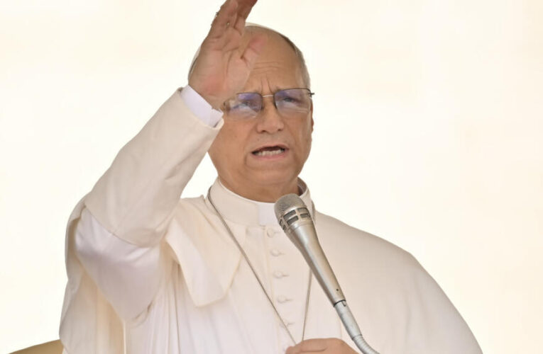 Pope defends migrants on symbolic visit to Mediterranean island frontier
