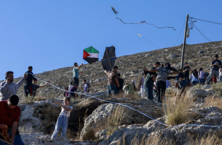 ‘This is our sky’: Palestinians fly kites in defiance of Israeli settlers in West Bank