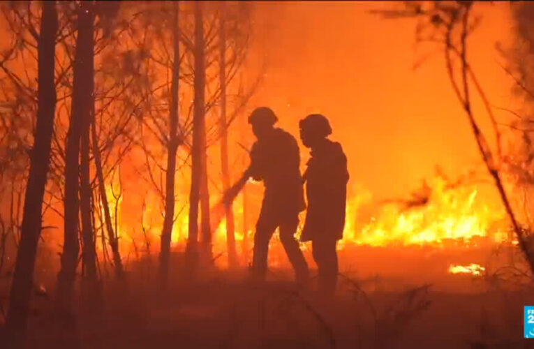 French firefighters battle the blaze with local residents through the night