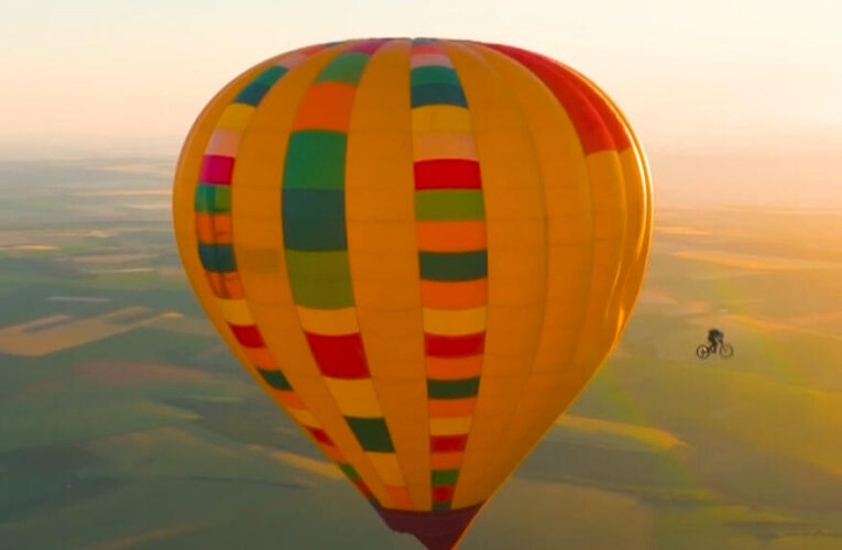 Mountain biker becomes first to ride off a hot air balloon