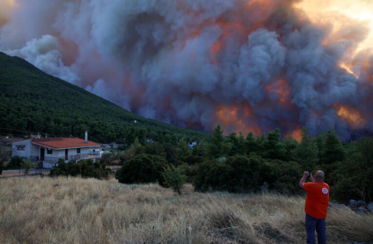 In blazing Greece, anger grows among residents forced to evacuate