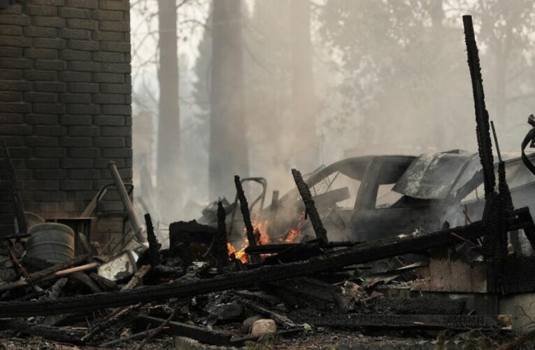 Arson suspected in devastating US wildfire that forced 60,000 to evacuate