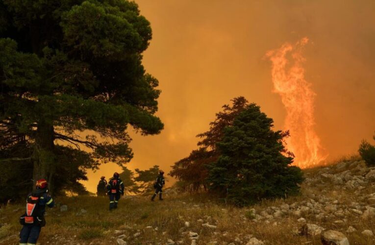 Greece’s wildfires claim lives as firefighters struggle to contain flames