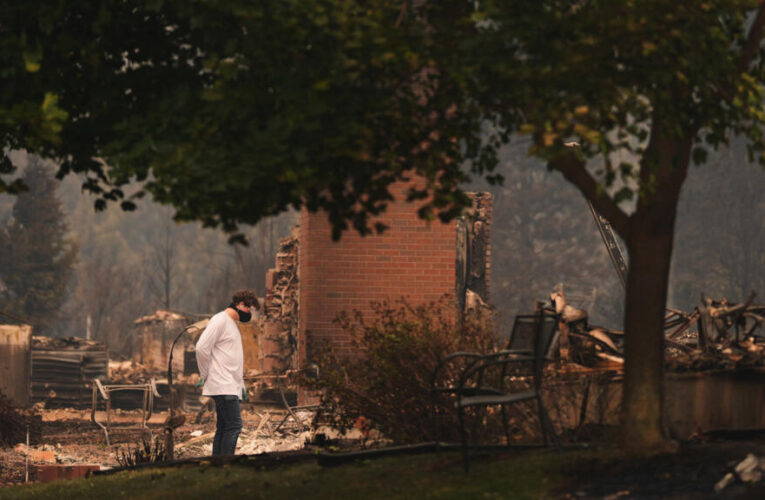 US northwest wildfires force 65,000 to flee as hundreds of buildings burn in Spokane