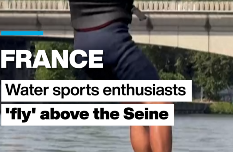 France: Water sports enthusiasts ‘fly’ above the River Seine